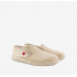 Ikonische beige Canvas-Sneaker mit Gummi- und Jutesohle. AM500